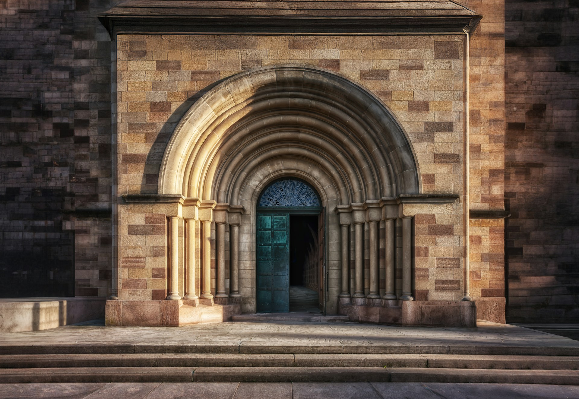 Romanesque stone archway with carved details